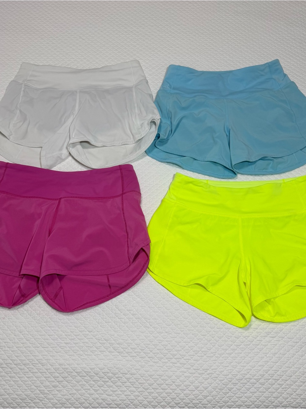 Lululemon 4 Pack Women’s Athletic Shorts White, Light Blue, Magenta, Neon Yellow